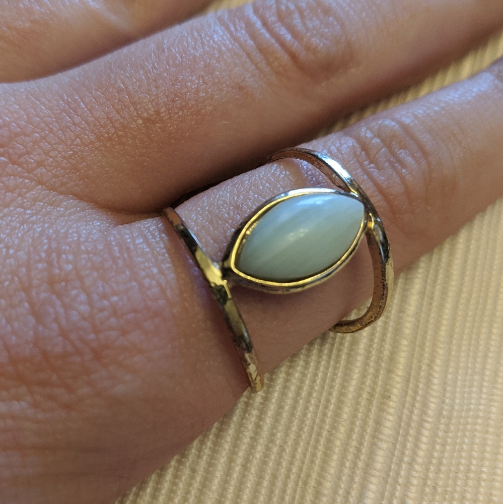 gold plated cage ring with gem